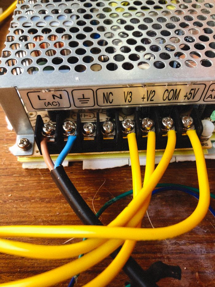 digital-01 Detailed shot of electronic power supply unit showing wiring and connectors.